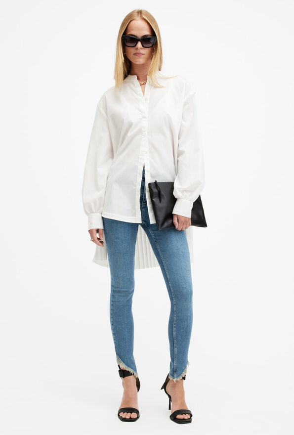 Shop the Dax Asymmetric Hem Skinny Denim Jeans.